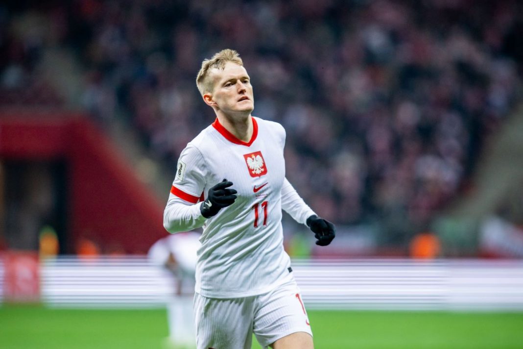 Karol Świderski w stroju reprezentacji Polski.